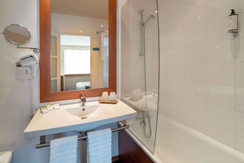 Shower, free toiletries, hair dryer, slippers