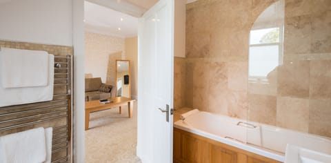 Junior Suite, 1 Double Bed with Sofa bed | Bathroom | Free toiletries, hair dryer, towels, soap