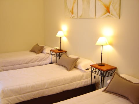 Standard Triple Room | Minibar, in-room safe, individually decorated, free WiFi