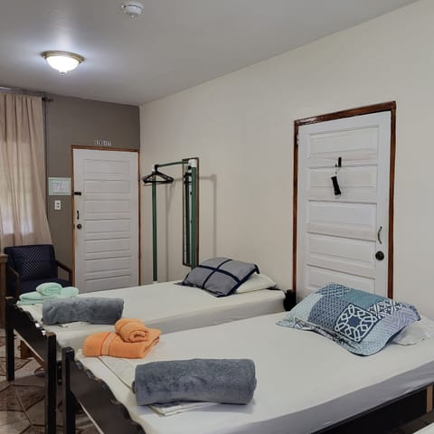 Standard Triple Room, 1 Bedroom, Ensuite, Ground Floor | 1 bedroom, individually decorated, individually furnished, desk