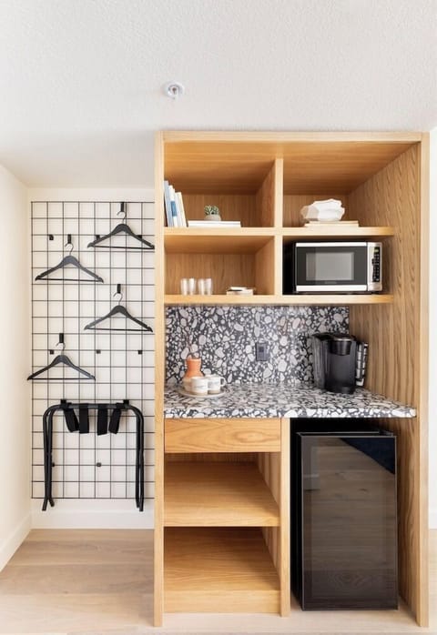 Premium Double Queen | Living area | 32-inch flat-screen TV with digital channels, TV, DVD player