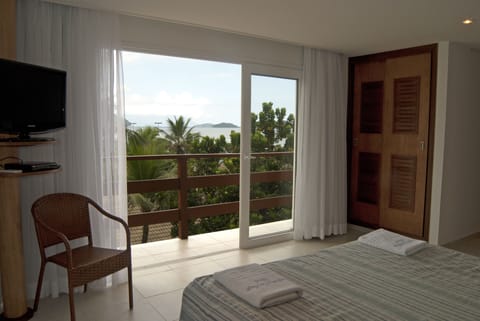 Club Room, Patio, Partial Sea View | Minibar, in-room safe, soundproofing, bed sheets