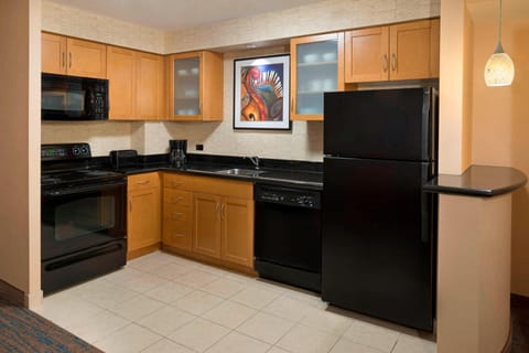 Suite, 2 Bedrooms | Private kitchen | Fridge, microwave, stovetop, dishwasher