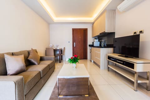 One Bedroom Apartment | Living area | 32-inch LCD TV with cable channels, TV