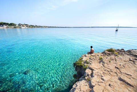 Private beach, free beach shuttle, sun loungers, beach umbrellas