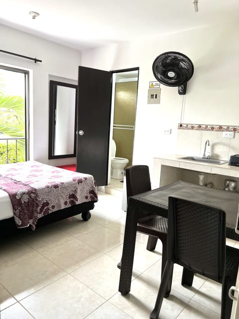 Basic Double Room, Kitchenette | Individually furnished, desk, laptop workspace, iron/ironing board