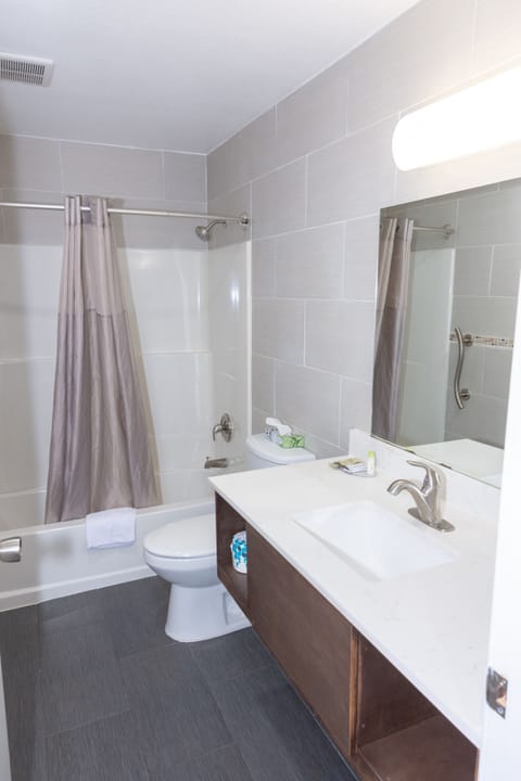 Combined shower/tub, rainfall showerhead, hair dryer, bathrobes