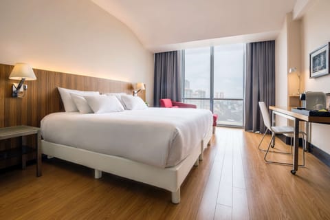 Hypo-allergenic bedding, down comforters, minibar, in-room safe