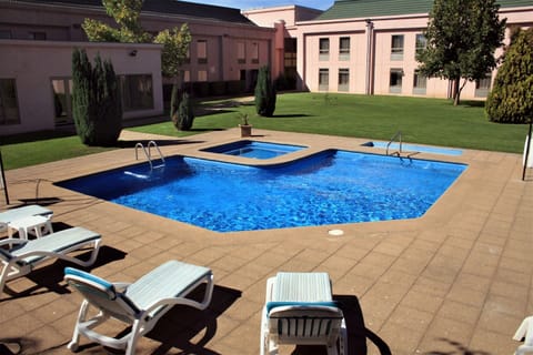 Outdoor pool, sun loungers