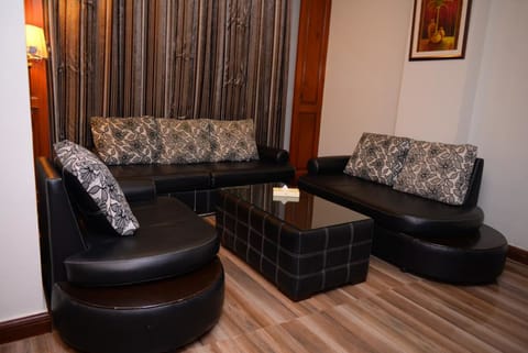 Deluxe Room, 1 Double Bed | Living area | LED TV, fireplace, pay movies