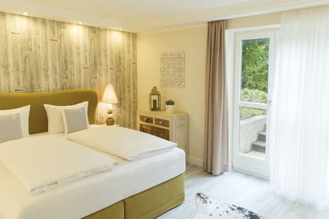 Landhaus Suite, Terrace with garden view | Desk, soundproofing, free WiFi, bed sheets