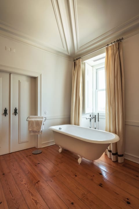 Jr Suite Romance | Bathroom | Designer toiletries, hair dryer, bathrobes, slippers