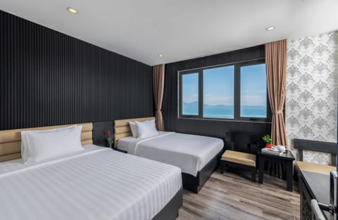 Deluxe Twin Room, Ocean View | Premium bedding, down comforters, in-room safe, desk