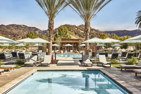 6 outdoor pools, cabanas (surcharge), pool umbrellas