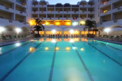 Seasonal outdoor pool, pool umbrellas, sun loungers