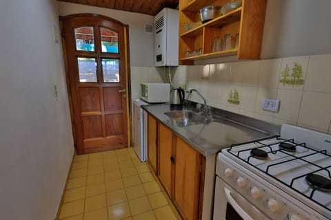 Family Bungalow, 2 Bedrooms | Private kitchen | Full-size fridge, microwave, oven, stovetop