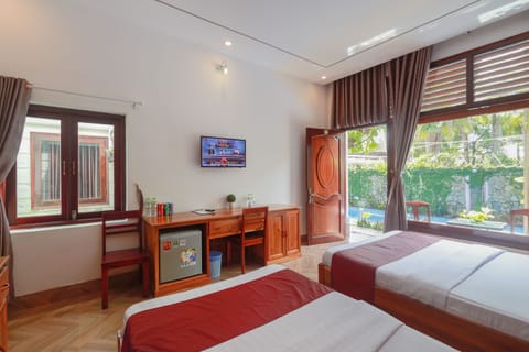 Deluxe Triple Room | Minibar, iron/ironing board, free WiFi, bed sheets