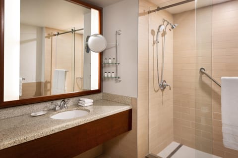 Junior Suite, 1 King Bed, Balcony (Balcony) | Bathroom | Combined shower/tub, deep soaking tub, designer toiletries, hair dryer