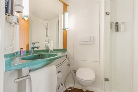 Shower, eco-friendly toiletries, hair dryer, towels