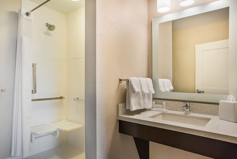 Suite, 1 Bedroom | Bathroom | Shower, free toiletries, hair dryer, towels