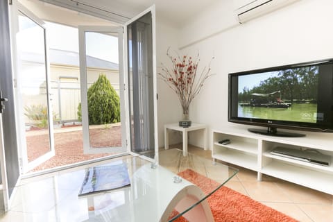 Urban - 2 Bedroom with Courtyards  | Living area | Flat-screen TV, DVD player