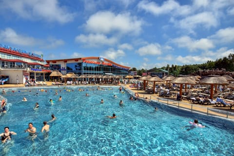 Indoor pool, seasonal outdoor pool, pool umbrellas, sun loungers