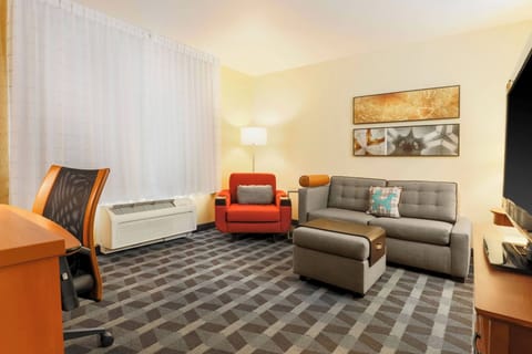 Suite, 1 Bedroom, Non Smoking | Living room | 45-inch Smart TV with cable channels, Netflix