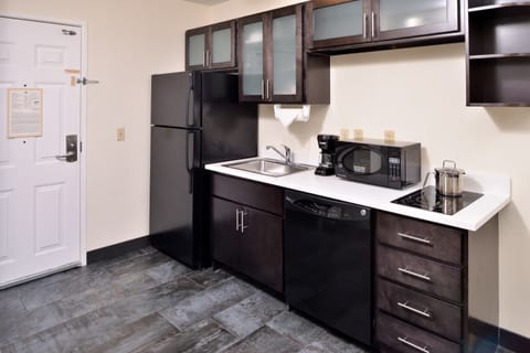 Studio Suite, 1 King Bed | Private kitchen | Fridge, microwave, stovetop, dishwasher