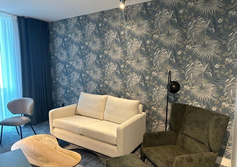 Junior Room, 1 King Bed | Living area | Flat-screen TV