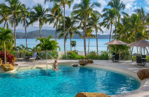 Outdoor pool, pool umbrellas, sun loungers