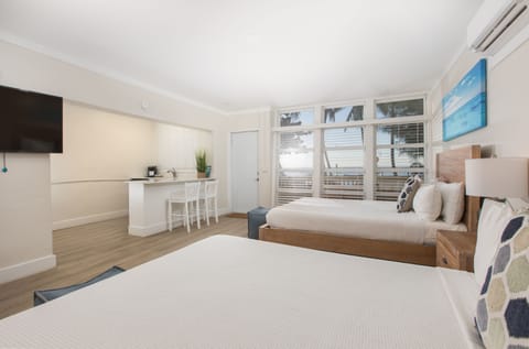 Superior Suite, 2 Queen Beds, Kitchenette, Bay View | Iron/ironing board, free WiFi, bed sheets