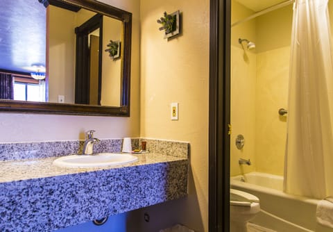 Queen Room with Two Queen Beds | Bathroom | Combined shower/tub, towels, soap, shampoo