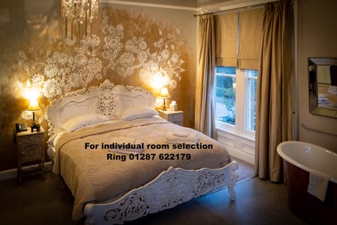 Deluxe Room, 1 King Bed | Desk, iron/ironing board, free WiFi, bed sheets