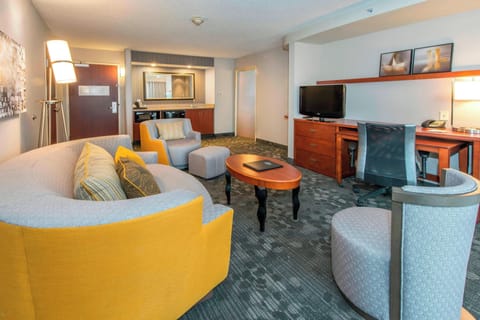 Suite, 1 King Bed with Sofa bed | Living area | 32-inch flat-screen TV with satellite channels, TV