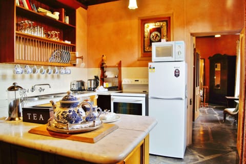 Luxury Cottage, Jetted Tub (Paprika) | Private kitchen | Full-size fridge, microwave, oven, stovetop