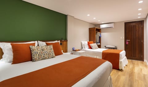 Triple Room | Minibar, in-room safe, free WiFi, bed sheets