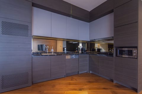 Suite, 2 Bedrooms | Private kitchen | Mini-fridge, microwave, coffee/tea maker, electric kettle