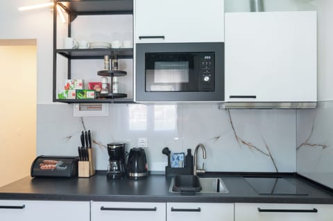 Apartment, Sea View | Private kitchen | Fridge, coffee/tea maker, electric kettle