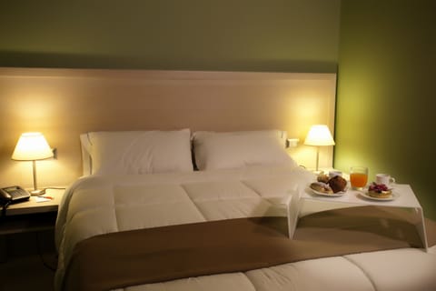 Premium bedding, down comforters, minibar, in-room safe