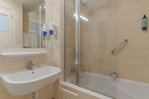 Combined shower/tub, eco-friendly toiletries, hair dryer, towels