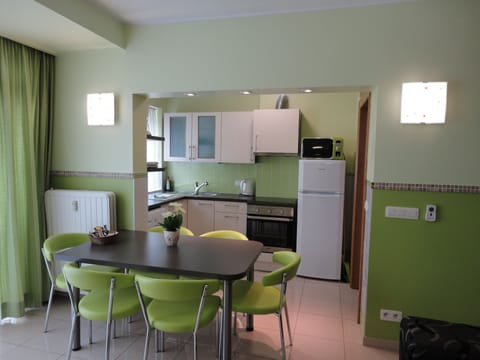 Luxury Apartment, 1 Bedroom | Private kitchen | Full-size fridge, microwave, stovetop, coffee/tea maker