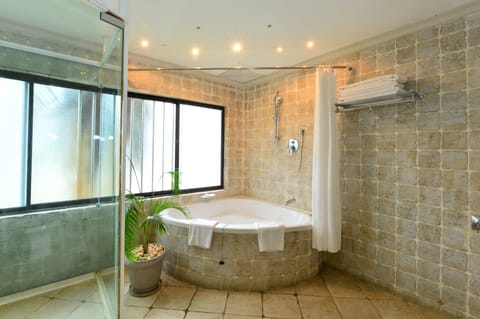 Presidential Suite, 1 Bedroom | Bathroom | Combined shower/tub, deep soaking tub, rainfall showerhead