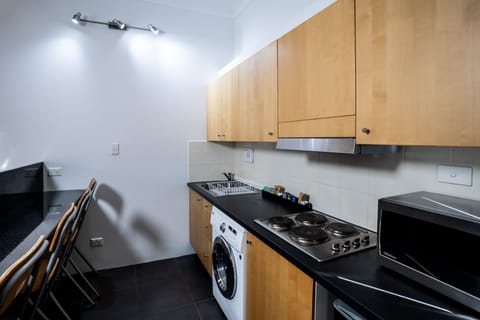 Studio Suite, 2 Queen Beds | Private kitchen | Fridge, microwave, coffee/tea maker, electric kettle