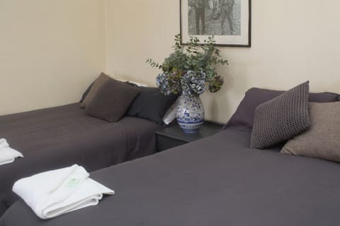 Standard Twin Room, 2 Double Beds, Shared Bathroom | Free WiFi, bed sheets