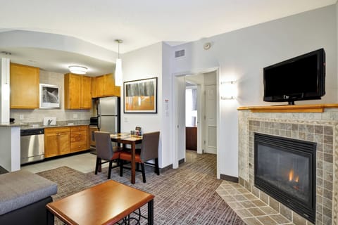 Executive Suite, 1 Bedroom, Non Smoking, Fireplace | Desk, laptop workspace, blackout drapes, iron/ironing board