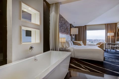 Superior Room | Bathroom | Combined shower/tub, deep soaking tub, free toiletries, hair dryer