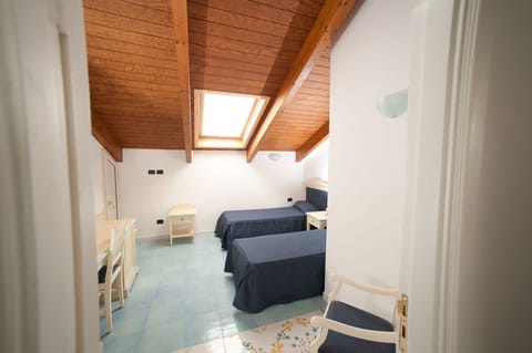 Apartment, 2 Bedrooms (Mansarda sul mare) | Iron/ironing board, cribs/infant beds, free WiFi