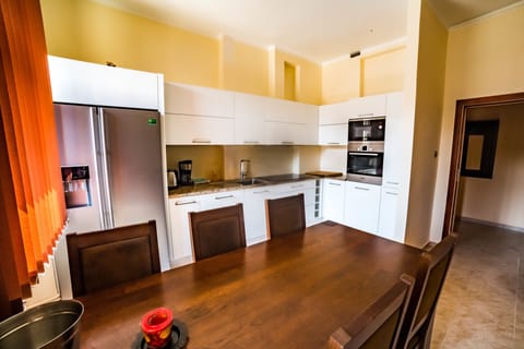 Family Apartment | Private kitchen | Fridge, microwave, oven, stovetop