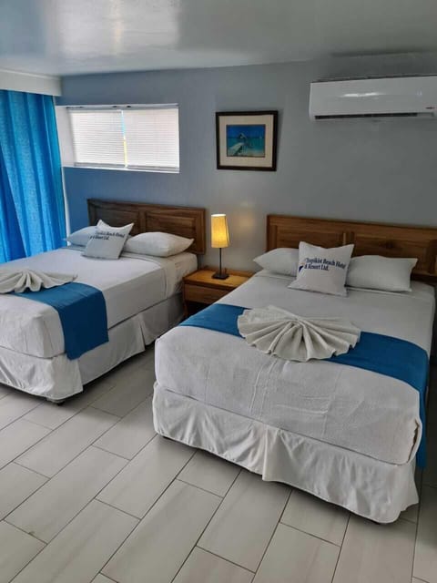 Standard Room, 2 Double Beds, Pool View | 1 bedroom, premium bedding, in-room safe, bed sheets