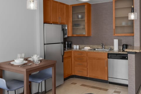 Full-size fridge, microwave, stovetop, dishwasher